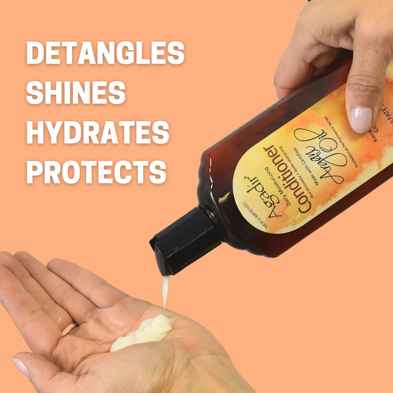 Close-up of the sulphate-free conditioner being poured from the bottle, showing its creamy texture.