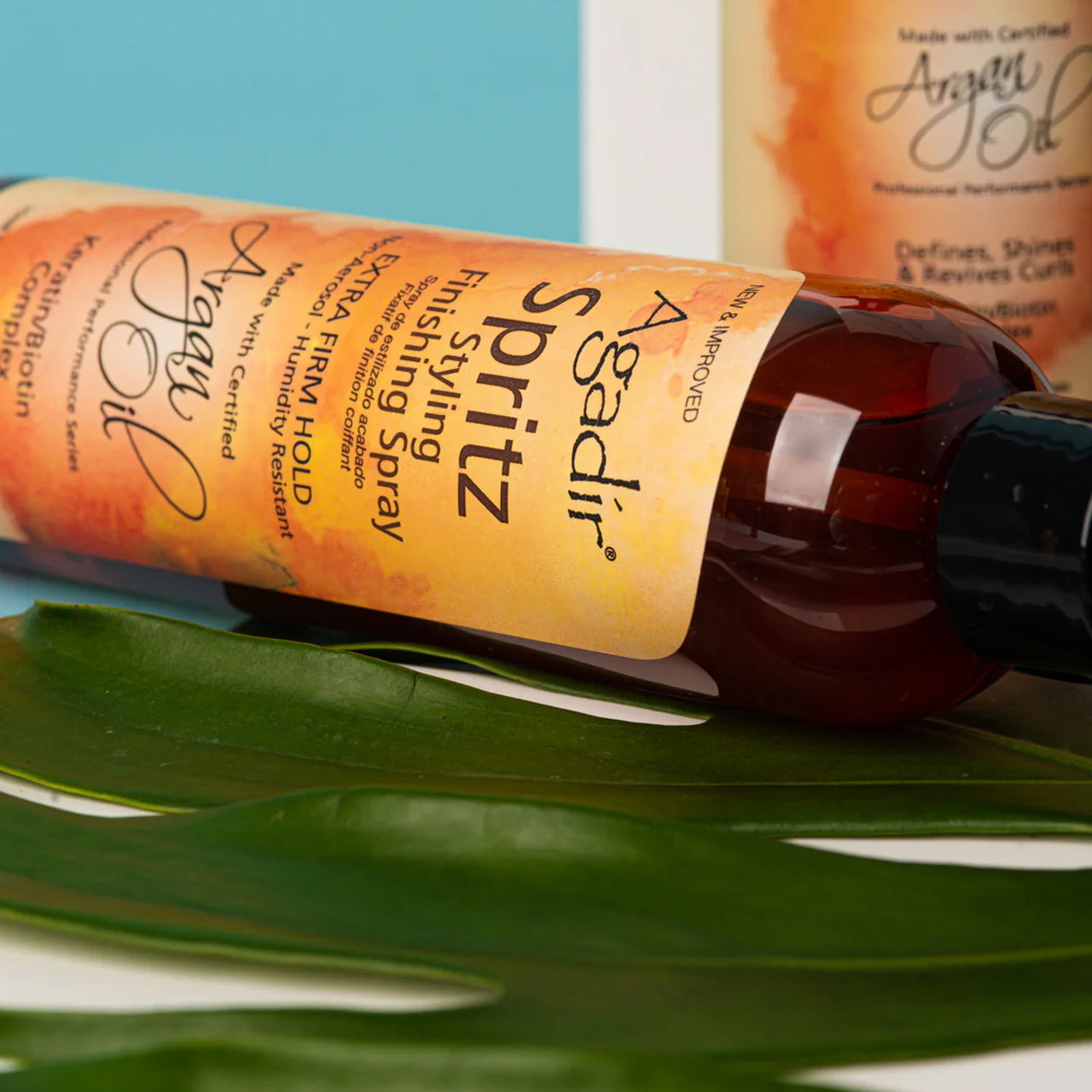 AGADIR SPRITZ spray in use for finishing a hairstyle