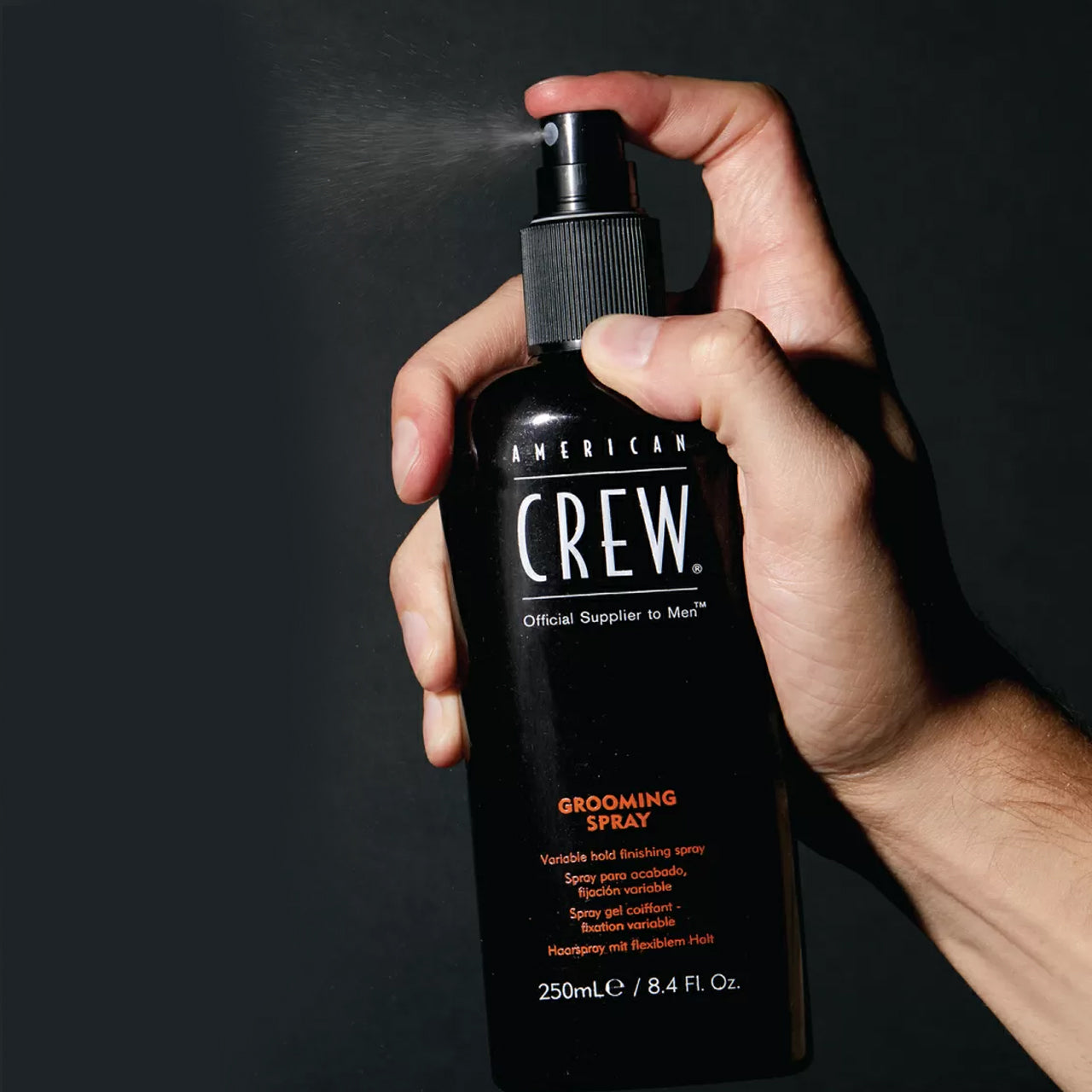 Premium men's hair styling spray by American Crew in 250ml container