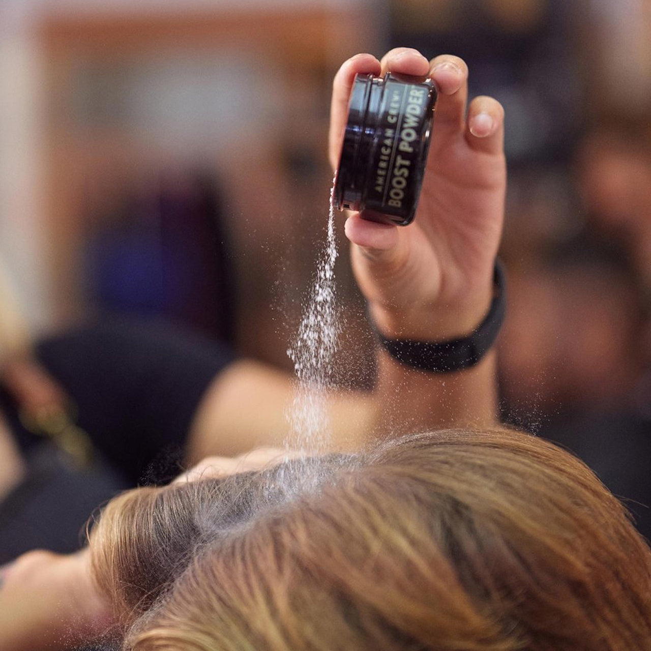 Close-up of American Crew Classic Boost Powder 10g applied to textured hair Effective hair styling solution
