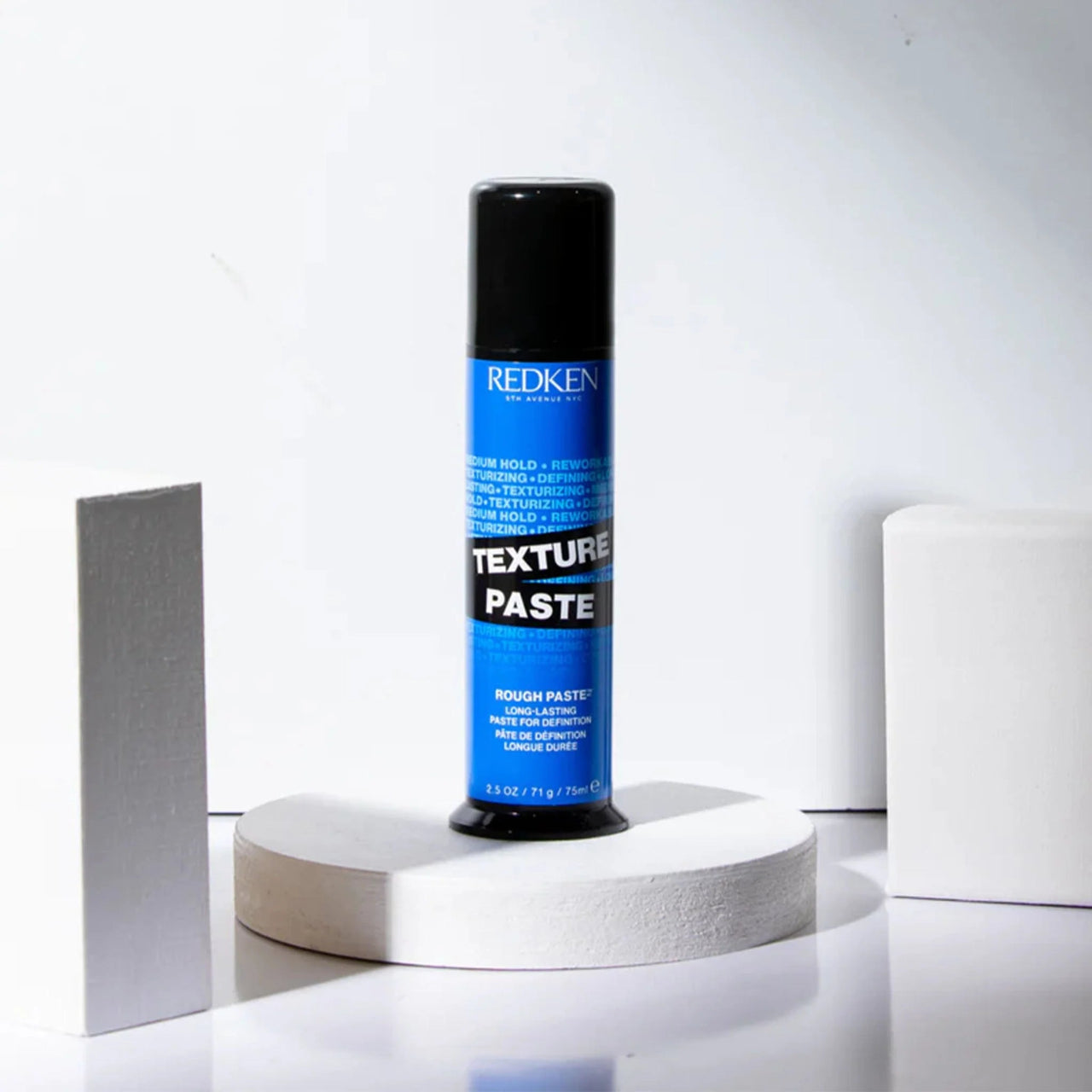 Side-by-side comparison showing hair transformation using Redken Texture Paste - before: unstyled hair, after: textured, defined style with matte finish