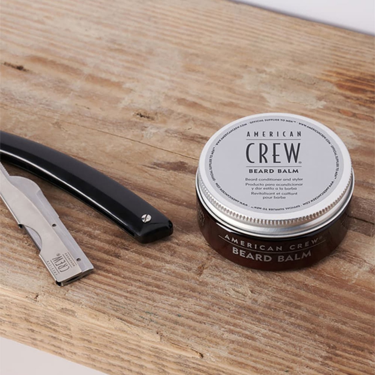 Premium men's beard grooming balm by American Crew in 50g container